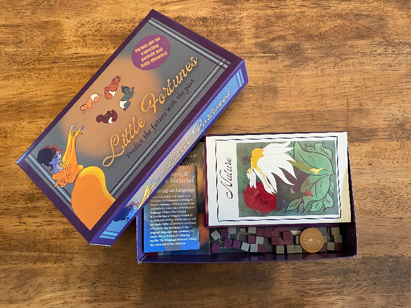 Load video: Pregnancy gift and baby shower game components such as game cards, tokens, cubes, and small booklets and have beautiful Art Deco and Victorian illustrations depicting pregnancy myths, folklore, and old wives tales.